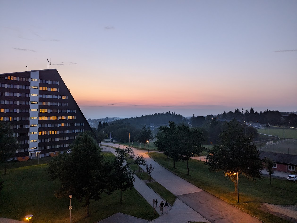 Main building of the hotel and the area around in the evening.