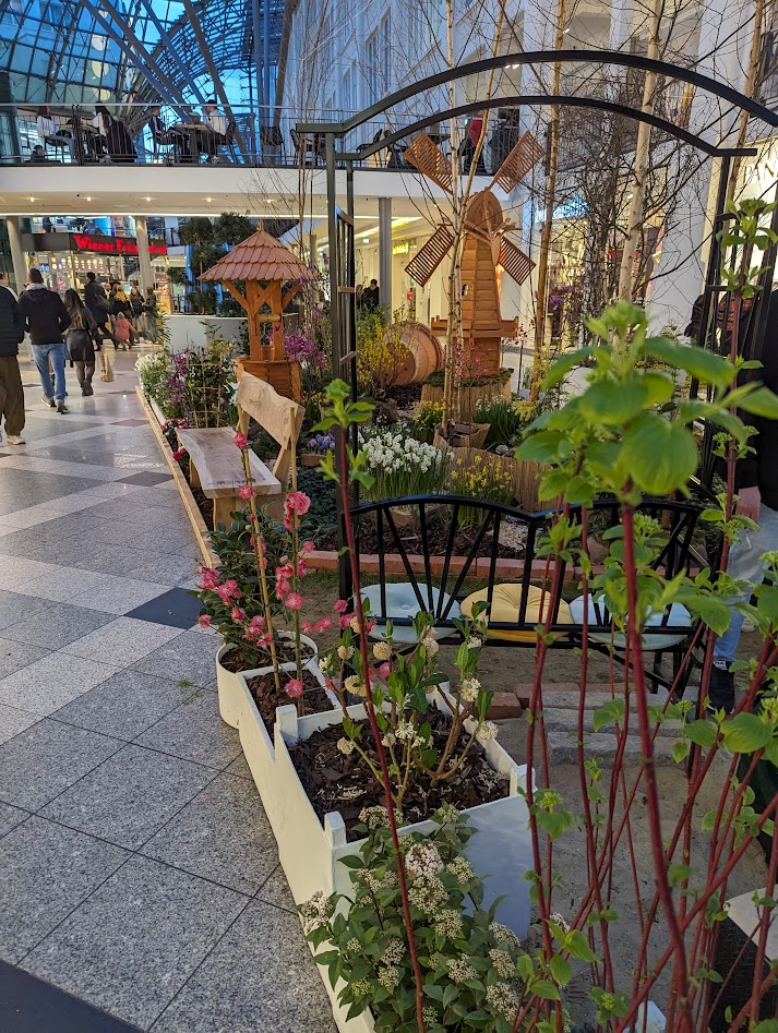 Inside a shopping centre a hint of spring and a playground was constructed.