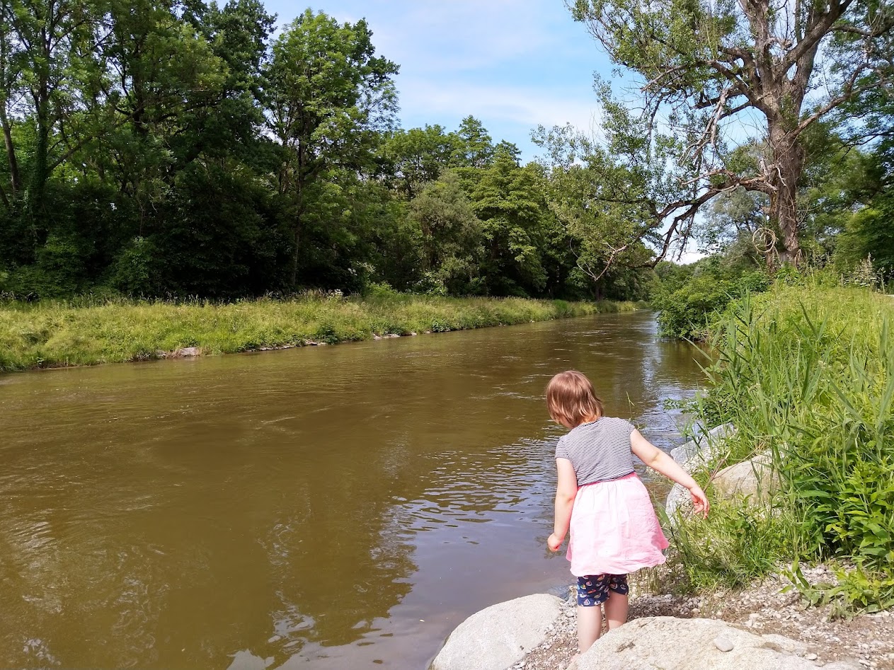 Close to a small river with girl.