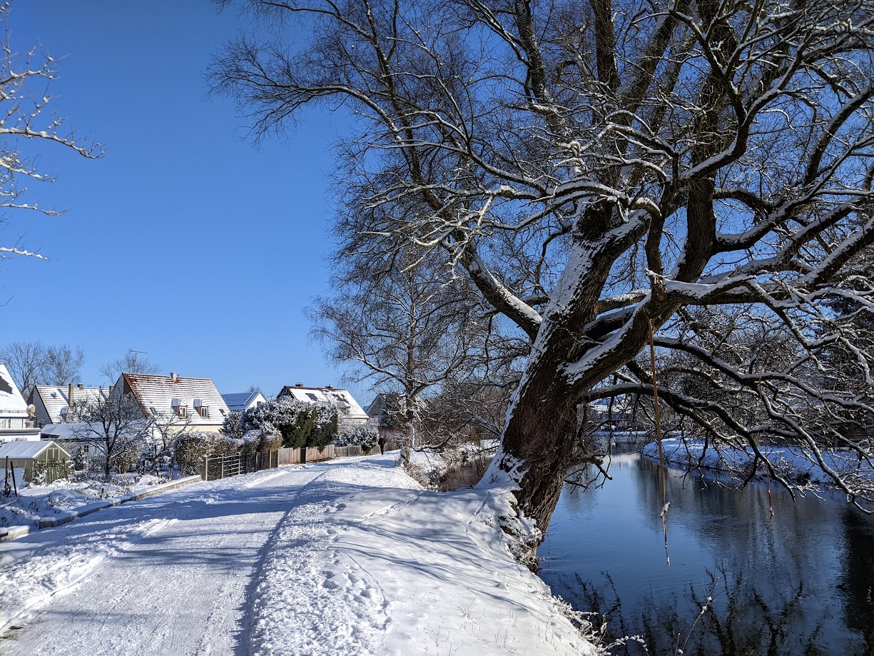 Sun, snow and the river nearby.