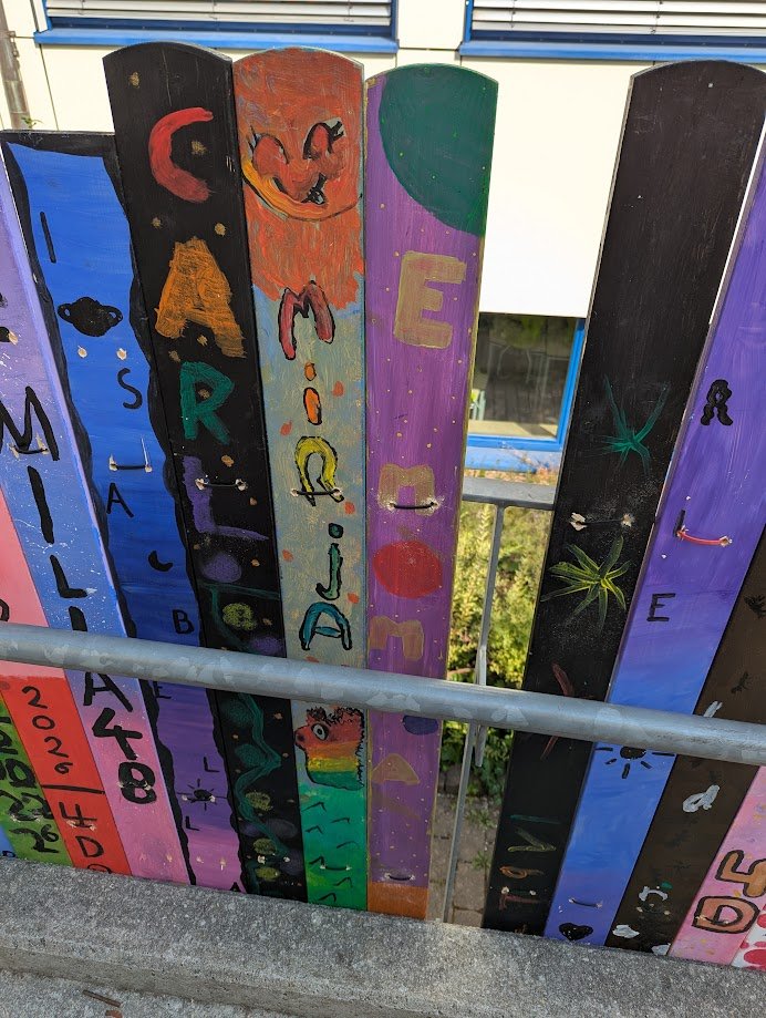 Self-painted pickets of the class of the tall one.